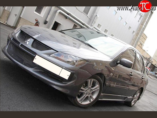 15 999 р. Передний бампер Evo Mitsubishi Lancer 9 2-ой рестайлинг седан (2005-2009) (Без сетки, Неокрашенный)  с доставкой в г. Нижний Новгород