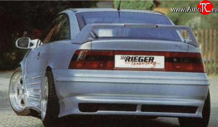 4 499 р. Накладка заднего бампера Rieger Opel Calibra A (1990-1997)  с доставкой в г. Нижний Новгород