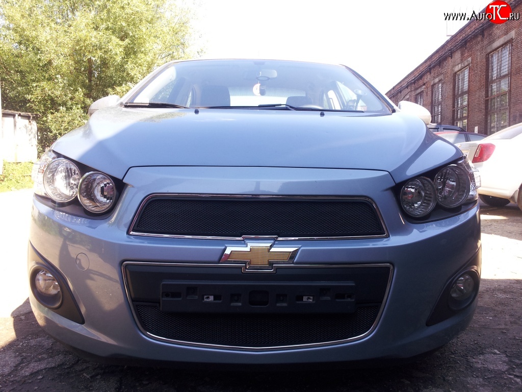 1 469 р. Нижняя сетка на бампер Russtal (черная) Chevrolet Aveo T300 седан (2011-2015)  с доставкой в г. Нижний Новгород