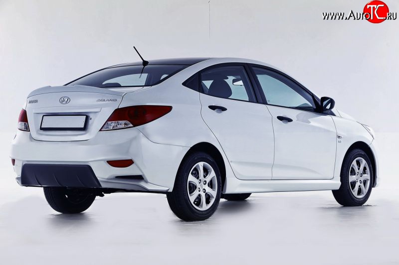 14 499 р. Задний бампер Sport  Hyundai Solaris  RBr (2010-2014) седан дорестайлинг (Неокрашенный)  с доставкой в г. Нижний Новгород