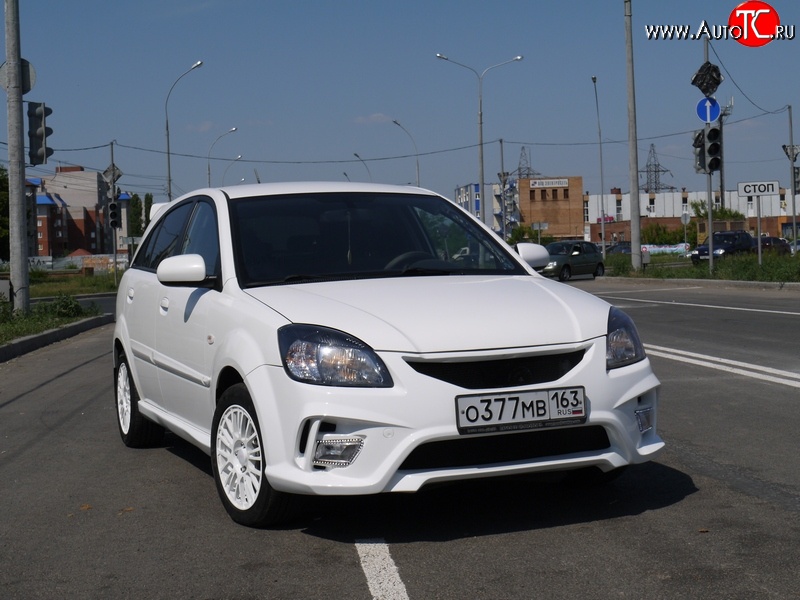 10 999 р. Передний бампер Vita Dm  KIA Rio ( 2 JB,  4 FB) (2005-2024) дорестайлинг седан, дорестайлинг, хэтчбэк 5 дв., рестайлинг, хэтчбэк 5 дв., рестайлинг седан (Без сетки, Неокрашенный)  с доставкой в г. Нижний Новгород