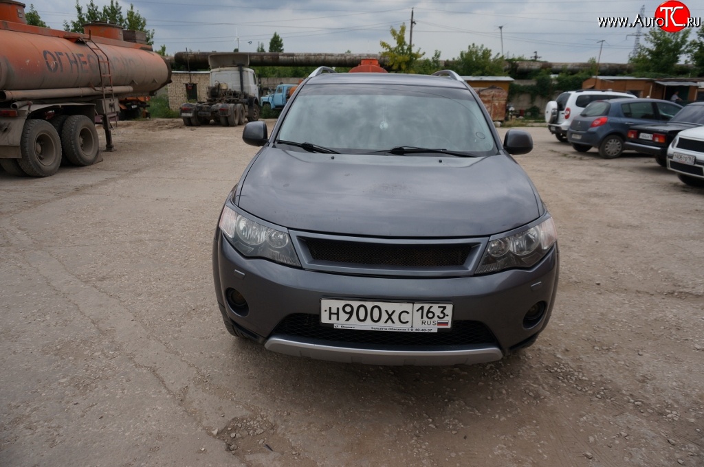 5 449 р. Решётка радиатора (рестайлинг) Sport Mitsubishi Outlander XL (CW)  рестайлинг (2010-2013) (Неокрашенная)  с доставкой в г. Нижний Новгород