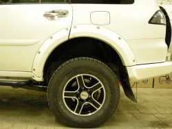 15 349 р. Накладки на колёсные арки BUSHWACKER Mitsubishi Pajero Sport PB дорестайлинг (2008-2013) (Неокрашенные)  с доставкой в г. Нижний Новгород. Увеличить фотографию 3